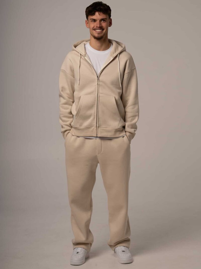 Męski komplet dresowy w kolorze beżowym z rozpinaną bluzą