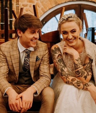 Beżowy garnitur męski w zieloną kratę glencheck