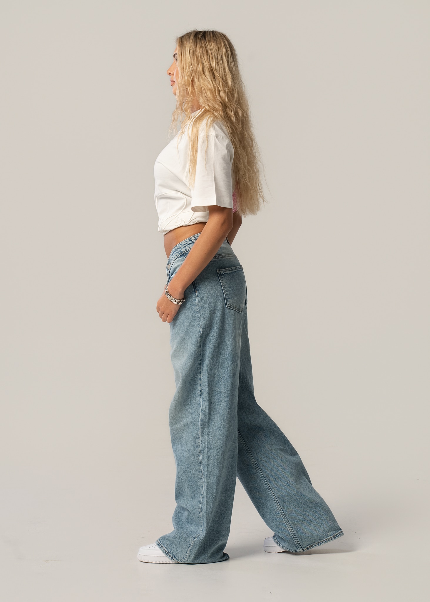 Jeansy damskie wide leg asymetryczne - obrazek 6