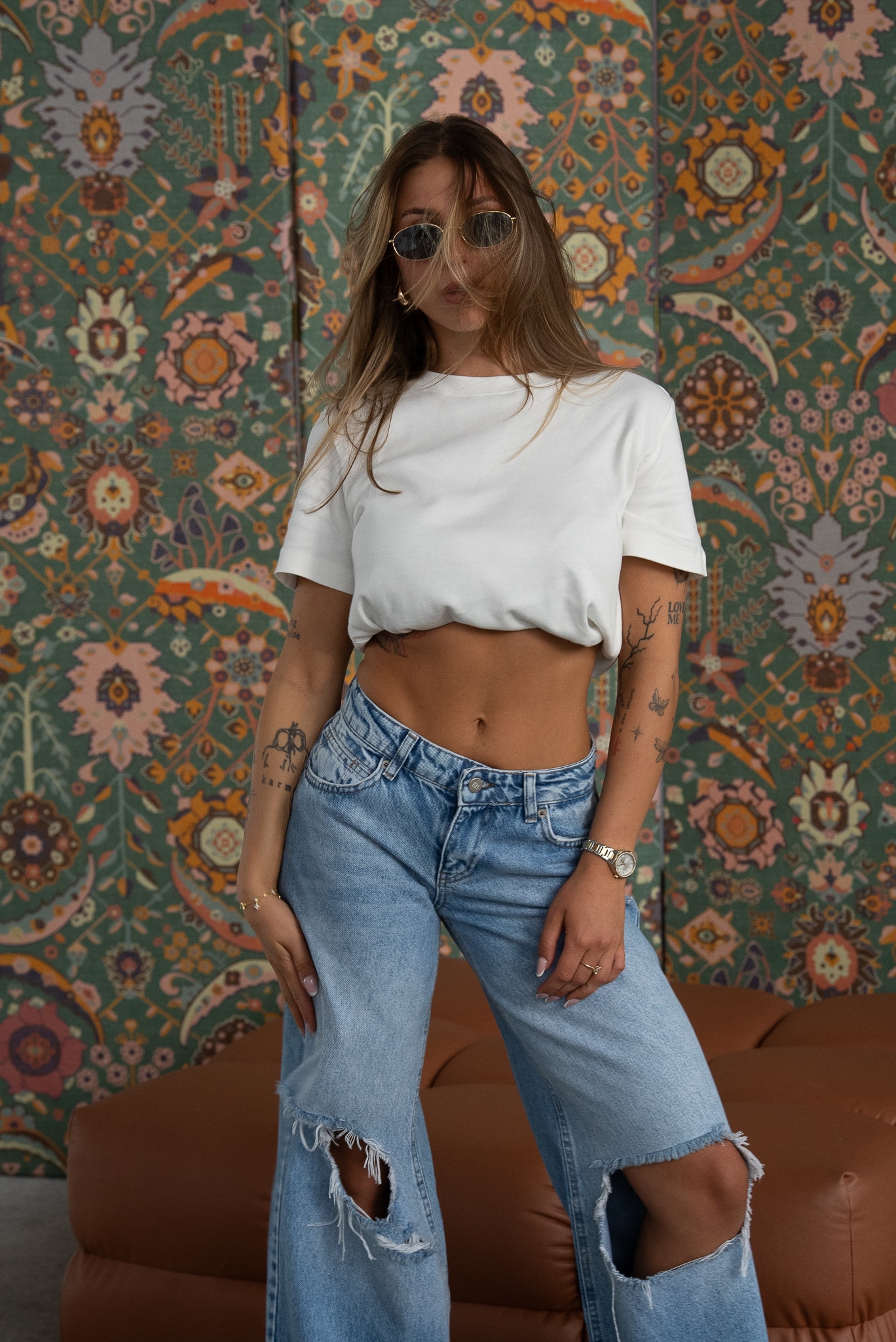 Jeansy damskie z dziurami - obrazek 11